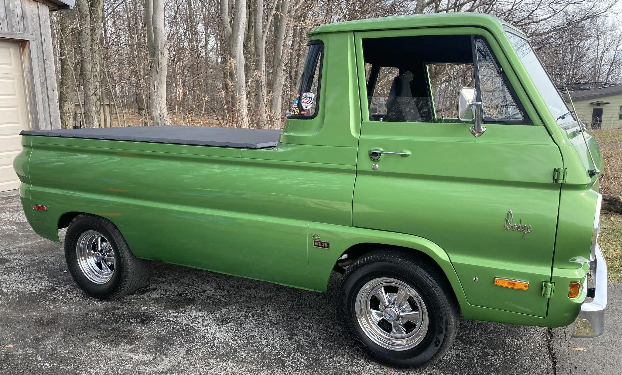 Parked bright green 1970 Dodge A100