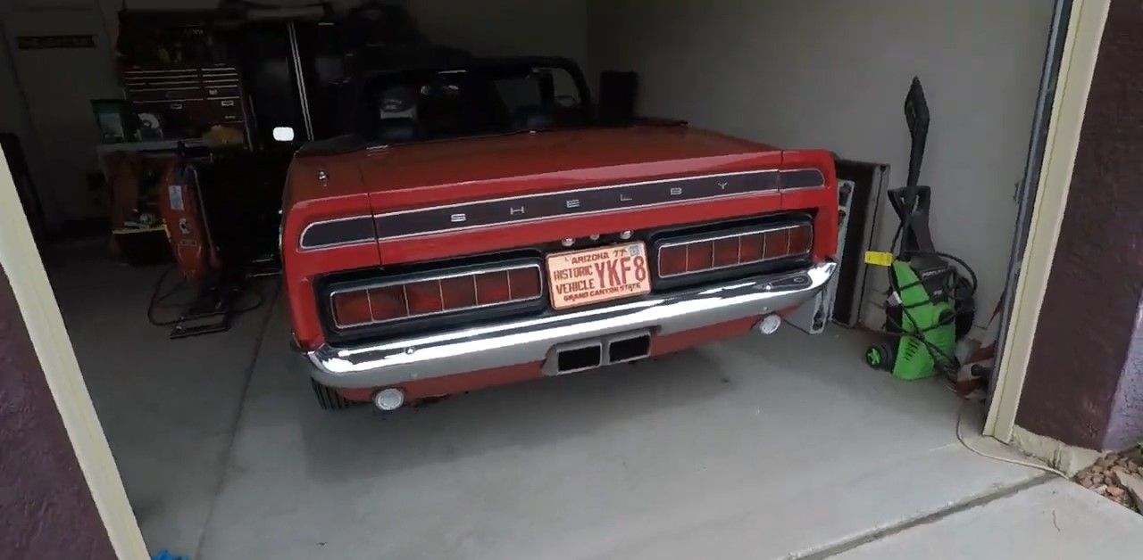 A Candyapple red Ford Mustang Shelby GT500 428 Cobra Jet rear shot